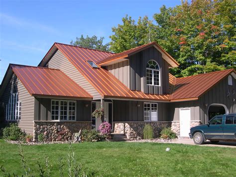 copper metal roof on dark house|metal roofing designs.